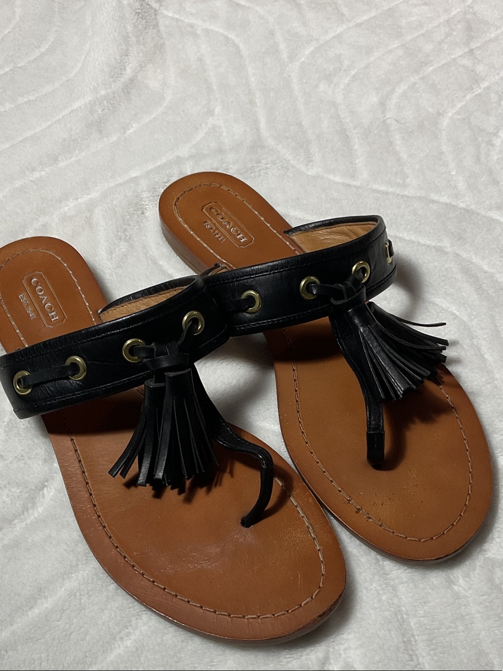 COACH Black Leather Tassel Thong Sandals with Brown Footbed
